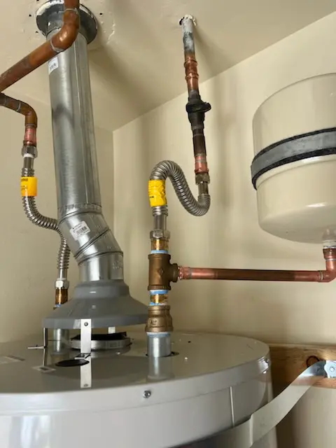 Water heater installation and plumbing repair in Clicquot